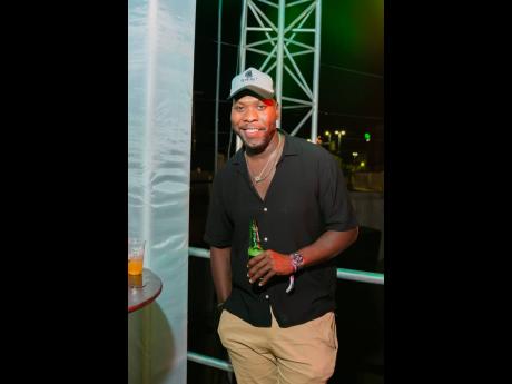 Chef Damion ‘Stewie’ Stewart, co-founder of Broken Plate Restaurant, takes in the pulsating rhythms.