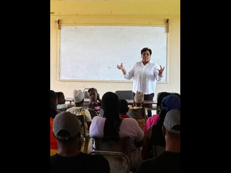 Credit: Contributed Dr Marsha Smith making a presentation to grandparents, parents and children at the Newell High School in St Elizabeth.