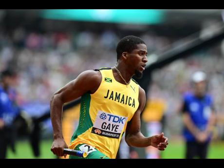 Demish Gaye runs the opening leg of the 4x400m Mixed Relay at the  2023 World Athletics Championships in Budapest, Hungary, on Saturday, August 19, 2023. 