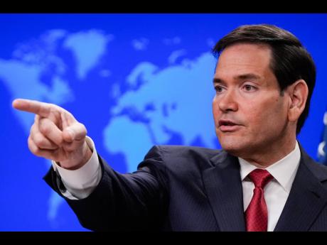Credit: Julia Demaree Nikhinson Secretary of State Marco Rubio speaks during a news conference at the State Department, Friday, December 19, 2025, in Washington. (AP Photo/Julia Demaree Nikhinson)