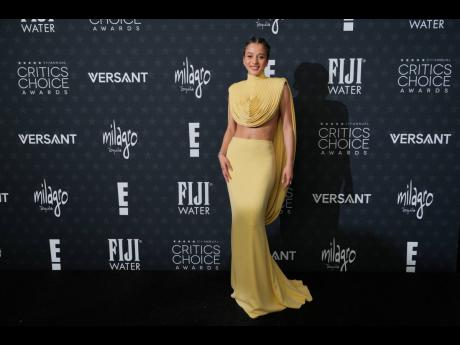 Chase Infiniti kicks off awards season in custom Louis Vuitton. 