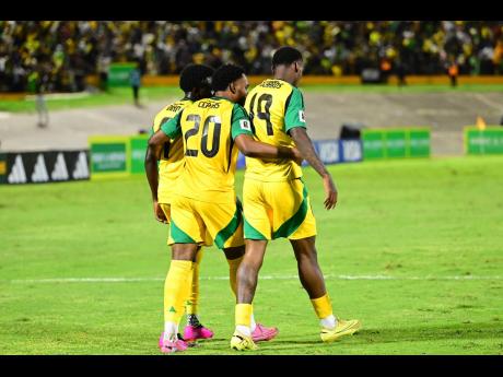 Reggae Boyz (from left) Kaheim Dixon, Renaldo Cephas, and Dujuan Richards have all made a provisional 52-man squad ahead of World Cup play-offs in March. 
