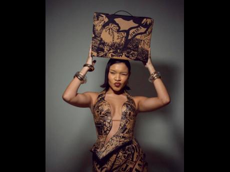 Anna-Lisa Guthrie turned this familiar Caribbean travel ritual – buying duty-free rum – into a bold fashion statement, transforming a rum box into an outfit that celebrates Jamaica in this Port of Call Duty Free collaboration.
