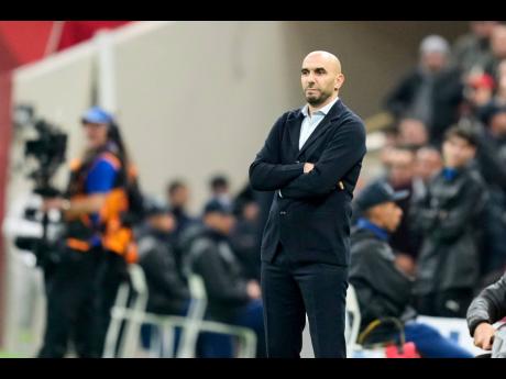 Morocco’s head coach Walid Regragui observes during the Africa Cup of Nations quarterfinal football match against Cameroon in Rabat, Morocco on Friday.