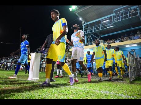 Waterhouse FC players take to the Drewsland field during a Jamaica Premier League match against Molynes United on December 28,2025.