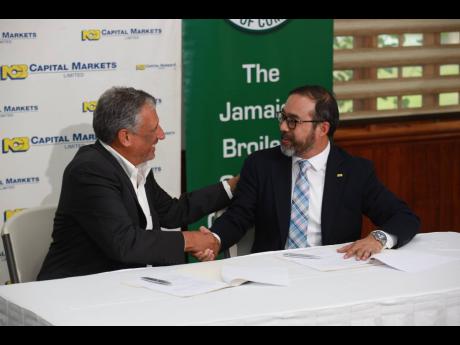 Christopher Levy (left), group president and CEO, Jamaica Broilers Group Limited, and Angus Young, CEO of NCB Capital Markets Limited and executive vice-president, corporate and investment banking at National Commercial Bank Jamaica Limited. 