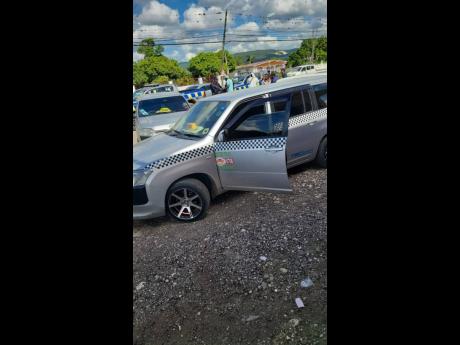 Taxi operators blocked roads in Clarendon earlier this week to protest poor conditions.