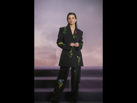 Claudia Jessie, or as ‘Bridgerton’ fans know her, Eloise, makes a bold statement in a black floral-embroidered Stella McCartney Resort 2026 suit.