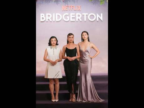 Gathering for a photo op are (from left) actresses Isabella Wei, Katie Leung and Michelle Mao. 