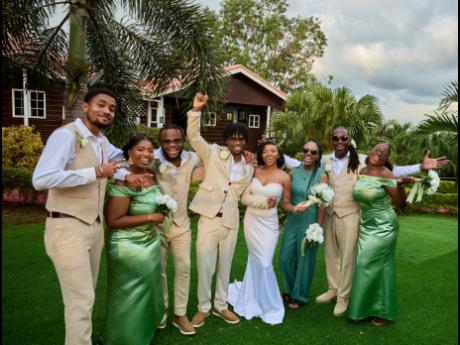 Andru-Lee and Selena (centre) are happily joined by their wedding party. From left: Aidan Alexander; Asia Thomas, maid of honour; Keyshawn Jones, best man; Tiffany Fisher-Rhoden, matron of honour; Andrew Cassanova, Andru-Lee’s father and best man; and Ga