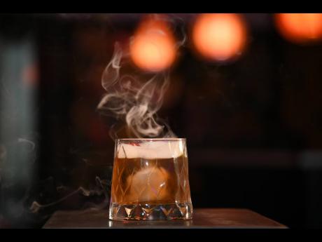 Credit: Antoine Lodge Here is a smoking look at the Worthy Park Old Fashioned drink.