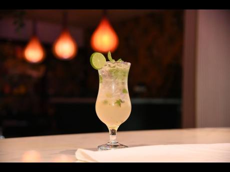 Credit: Antoine Lodge The Worthy Park Swizzle combines ingredients such as mint leaves, lime juice, cane sugar syrup and cocktail bitters, along with the Worthy Park Select.