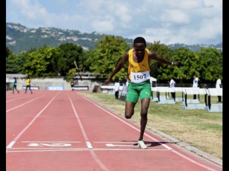 Credit: File Ryan Achau of St Jago High School comes home a lonely winner in the Class One boys’ 1500 metres at the McKenley/Wint Invitational Meet at Calabar High School last year.