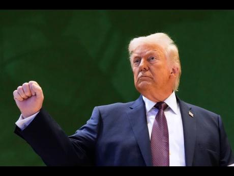 US President Donald Trump leaves after a signing ceremony of his Board of Peace initiative at the Annual Meeting of the World Economic Forum in Davos, Switzerland, Thursday, Jan. 22, 2026. 