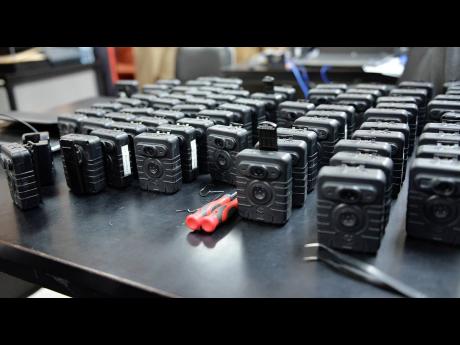 File 
Body-worn cameras on display at the Police Commissioner’s Office in St Andrew.