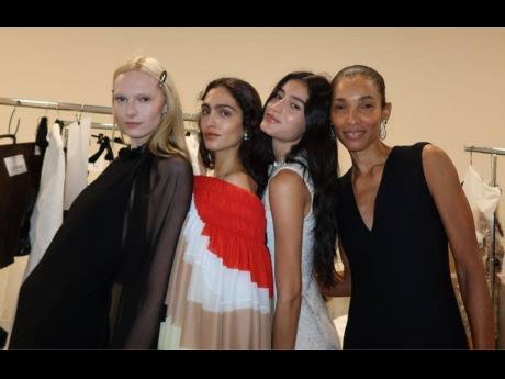 From left: It’s all model magic backstage (from left) Alex Consani, Sara Caballero, Luiza Perote and Romae Gordon. 