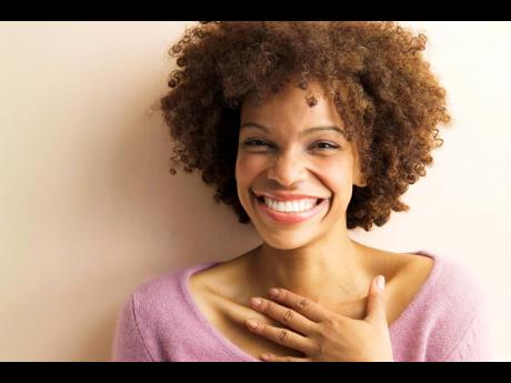 Credit: Contributed Flattered Woman Smiling