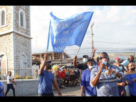 Credit: File
This 2022 photo shows Clarendon Neighbourhood Watch-JCF Peace March which was organised under the theme ‘Resolving Conflict Without The Use Of Violence’.