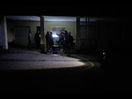People celebrate a birthday during a scheduled power outage in Santa Cruz del Norte, home to one of Cuba’s largest thermoelectric plants, late Tuesday, February 3, 2026. (AP Photo/Ramon Espinosa)