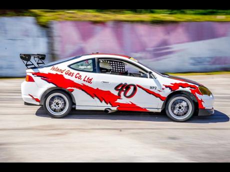 Modified Production 2 champion Peter Jaggon leans into Corner 3 at Dover, pushing his Honda to its absolute limit during a recent meet.