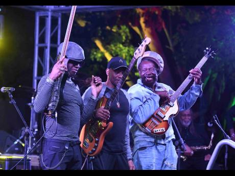 From left, Donald ‘Danny Bassie’ Dennis, Daniel ‘Danny Axeman’ Thompson and Eroll ‘Flabba’ Holt on stage after performing at JaRIA’s Reggae Wednesdays.
