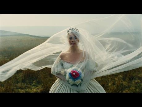 Margot Robbie, who plays the role of Catherine Earnshaw in ‘Wuthering Heights’, appears in a wedding scene.