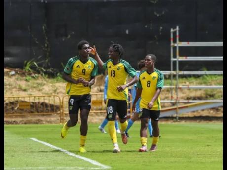  Jamaica Under-17’s Kelvin D Brown (left) celebrates after scoring a goal against Aruba with teammates Jude Royes (centre)  and Jaheem Bennett during their Concacaf U17 Qualifier at the Costa Rica Football Federation field on Friday, February 6.