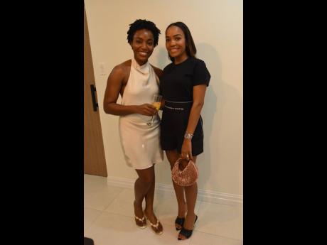 Credit: Ian Allen Dr Mariesha Terrelonge Lee (left), aesthetic, laser and regenerative physician, poses with Shanice Gore at the cocktail-chic affair.