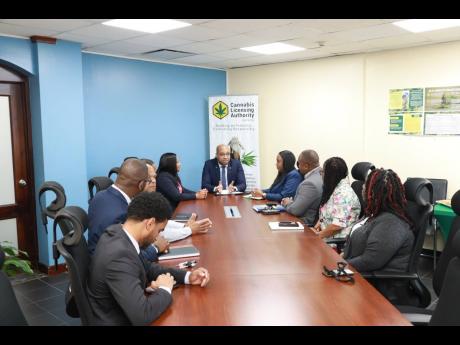 Delano Seiveright, minister of state in the Ministry of Industry, Investment and Commerce,, meets with the full executive management team of the Cannabis Licensing Authority during a recent boardroom briefing and working visit to the Authority’s offices.