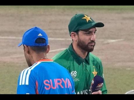 Credit: AP India’s captain Suryakumar Yadav (left) and Pakistan’s captain Salman Ali Agha walk past each other after the coin toss of the T20 World Cup cricket match between India and Pakistan in Colombo, Sri Lanka, yesterday.