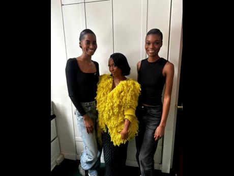 Legendary Jamaican sprinter and ‘Mommy Rocket’, Shelly-Ann Fraser-Pryce went backstage at Sunday’s Diotima show to greet SAINT International models Tami Williams (left) and Naki Depass.