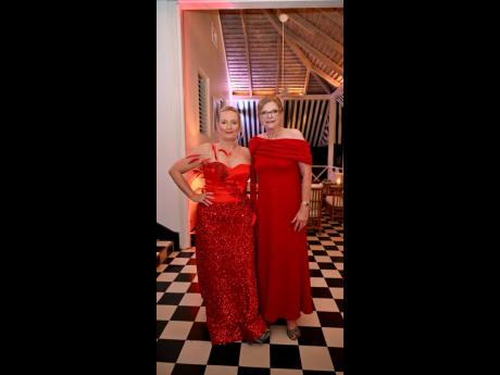 The happiness was evident on Hanover Charities’ chair, Katrin Casserly, wearing a red Uzuri International gown as she posed with vice chair Jennifer Flanagan. 