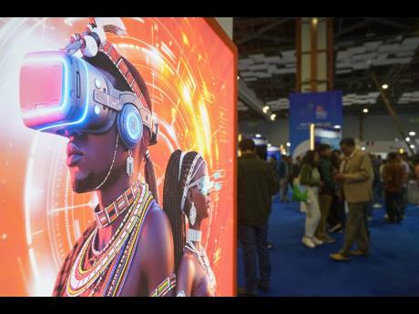 Credit: AP
Visitors stand next to an advertising billboard at AI summit in New Delhi, India.