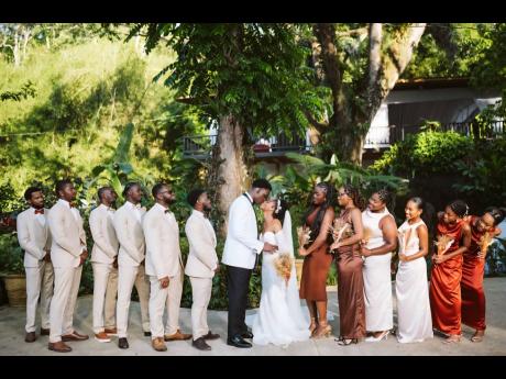 The newly-weds, Dalkeith and Rohanna (centre), were surrounded by the great love and support of their wedding party.