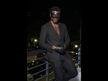 Mr World Jamaica 2024 Tarique Barrett gives a hint of mystery with his all black look.