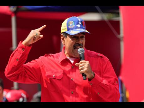 Venezuela's President Nicolas Maduro speaks to supporters during an event at the Miraflores Presidential palace in Caracas, Venezuela, February 4, 2024. (AP Photo/Matias Delacroix,File)