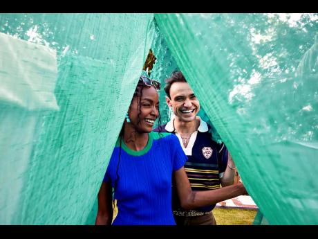Credit: Contributed The Rock’s Williams — dressed in Wales Bonner — and Scotsman Thomas Doherty in a vignette from The Glenlivet 12 Year Old Jamaica Edition campaign, directed by Louis English.