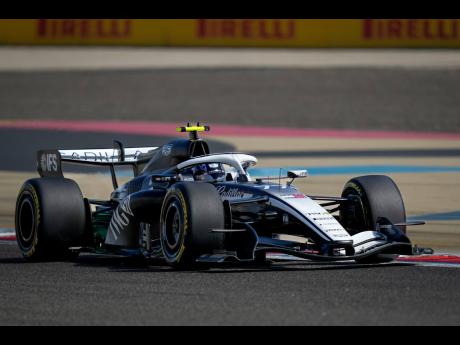 Cadillac driver Valtteri Bottas of Finland steers his car on the third day of Formula One pre-season test at the Bahrain International Circuit in Sakhir, Bahrain, Friday, February 13, 2026.