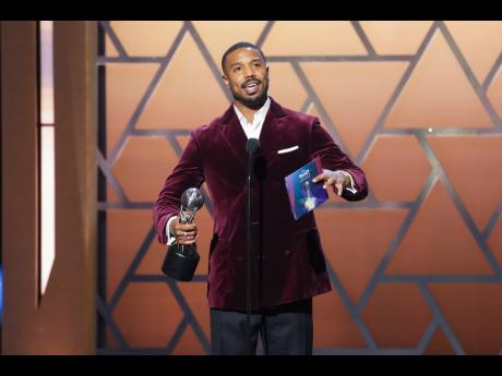 Michael B. Jordan accepts the award for Entertainer of the Year. 