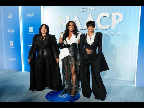 Credit: AP Hip-hop trailblazers Salt-N-Pepa and NAACP Image Awards Hall of Fame inductees – Cheryl ‘Salt’ James, Deidra ‘Spinderella’ Roper, and Sandra ‘Pepa’ Denton – wore coordinated looks by Anthony Lattimore.