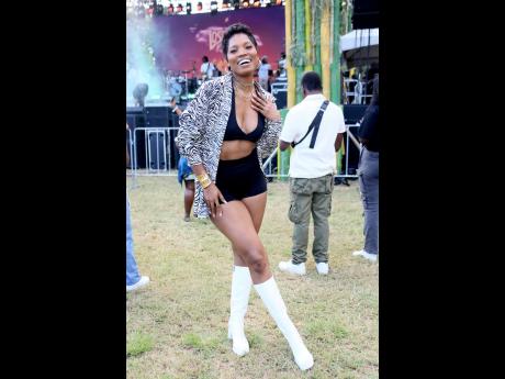 Dianne O. Brown, bikini athlete, strikes a pose for our lens as she gets ready to have a lit time.