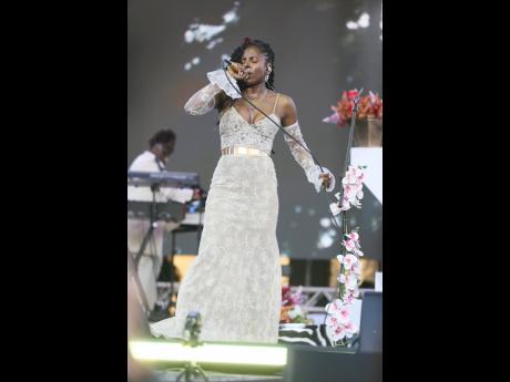 Credit: Nathaniel Stewart Jah9 on day two of the Lost in Time music festival last Sunday at the Hope Botanical Gardens.