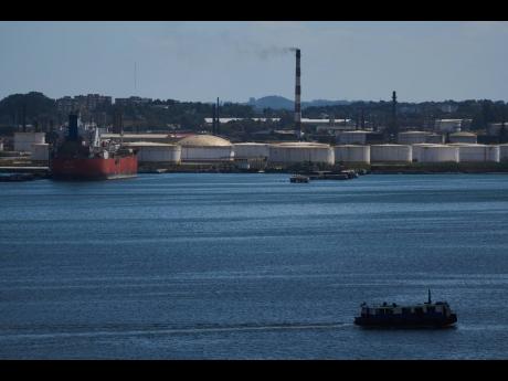 Credit: Ramon Espinosa A ferry crosses Havana Bay past the Nico Lopez oil refinery where a Cuban tanker is anchored in Havana, Cuba, Thursday, February 26, 2026. (AP Photo/Ramon Espinosa)