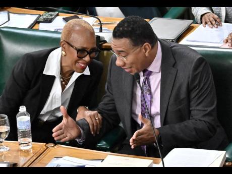 Credit: Rudolph Brown Minister of Finance and the Public Service Fayval Williams and Prime Minister Dr Andrew Holness at the opening of the 2026-2027 Budget Debate in the House of the Representatives on March 10, 2026.