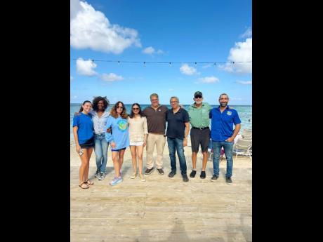 St Ann Custos Joseph Issa (centre) with board members of the newly formed St Ann Marine Association: (from left) Francesca Russell, Sharon Harper, Alex Ghisays, Asha Issa, Prem Mahtani, Mike Drakulich and Jonathan Hernould. 