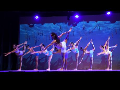 Credit: Contributed Andrew Bailey (centre) leading dancers in Tony Wilson’s ‘Streams’ on opening night at the Little Theatre in St Andrew. The show wraps at the Miramar Cultural Centre, Florida, this Saturday.