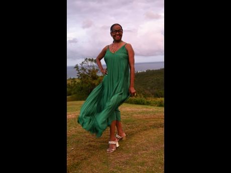 Tourism executive and empowerment speaker Marsha-Ann Donaldson pauses for a photograph. 