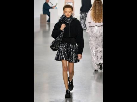 Dill rocked two separate Looks 6 and 33 — the latter seen here —  for Japanese fashion designer Yusuke Takahashi’s latest collection titled, ‘Knit-Ware: Sculpture’ that was presented at the Palais de Tokyo on the final day of the Parisian fall/wi