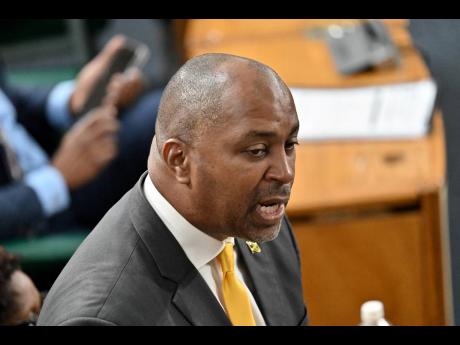 Julian Robinson, opposition spokesman on finance, makes his contribution to the 2026-2027 Budget Debate in the House of Representatives in downtown Kingston on Thursday. 