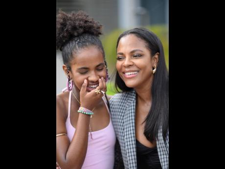 Photos by Antoine Lodge/Photographer 
Fashion designer and stylist Kaysian Wilson shares a light moment with her daughter, Jazzmine Bourke. Wilson reminds her that confidence is the most beautiful thing she can wear.